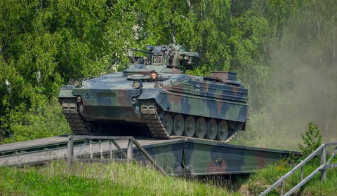 3 phóng viên Tân Hoa xã do thám căn cứ NATO? - Ảnh 1. 3 phóng viên Tân Hoa xã do thám căn cứ NATO? - Ảnh 1.