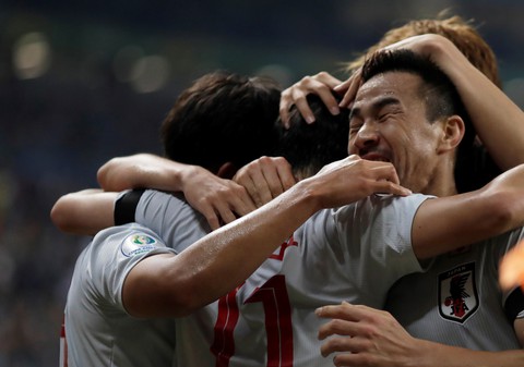 Hòa Uruguay 2-2, Nhật Bản nuôi hi vọng vào tứ kết - Ảnh 1. Hòa Uruguay 2-2, Nhật Bản nuôi hi vọng vào tứ kết - Ảnh 1.