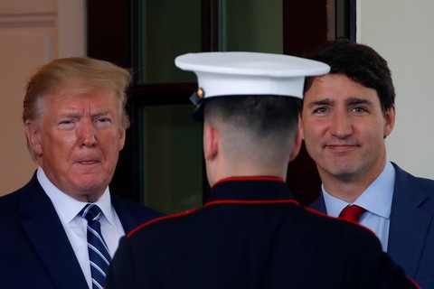 Ông Trump tuyên bố sẽ gây sức ép vụ công dân Canada bị bắt khi gặp ông Tập - Ảnh 1. Ông Trump tuyên bố sẽ gây sức ép vụ công dân Canada bị bắt khi gặp ông Tập - Ảnh 1.