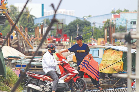 Sài Gòn và những chuyến phà chở bao chuyện đời - Ảnh 2. Sài Gòn và những chuyến phà chở bao chuyện đời - Ảnh 2.