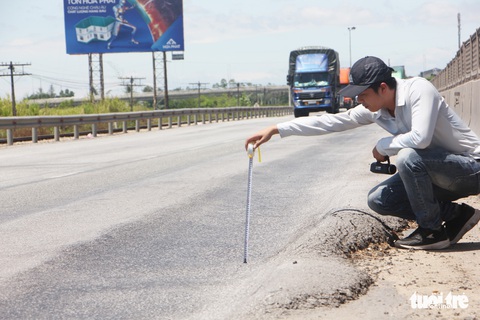 Hết bảo hành, quốc lộ 1 lún như luống khoai - Ảnh 1. Hết bảo hành, quốc lộ 1 lún như luống khoai - Ảnh 1.