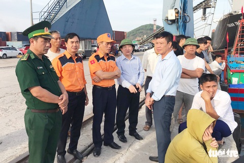 Lấy mẫu ADN nhận dạng thi thể ngư dân tàu cá bị đâm chìm - Ảnh 3. Lấy mẫu ADN nhận dạng thi thể ngư dân tàu cá bị đâm chìm - Ảnh 3.