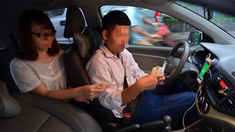 Hợp tác GrabTaxi, taxi truyền thống than vắng khách sử dụng - Ảnh 1. Hợp tác GrabTaxi, taxi truyền thống than vắng khách sử dụng - Ảnh 1.