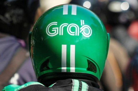 Malaysia điều tra hành vi độc quyền của Grab - Ảnh 1. Malaysia điều tra hành vi độc quyền của Grab - Ảnh 1.