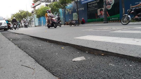 Điện lực Sài Gòn cam kết sửa chữa mặt đường quận 1, quận 3 trước 30-9 - Ảnh 1. Điện lực Sài Gòn cam kết sửa chữa mặt đường quận 1, quận 3 trước 30-9 - Ảnh 1.