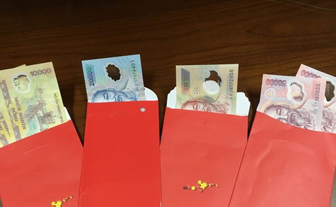 ‘Lì xì có 100.000 đồng, keo thấy ớn’ - Ảnh 1. ‘Lì xì có 100.000 đồng, keo thấy ớn’ - Ảnh 1.
