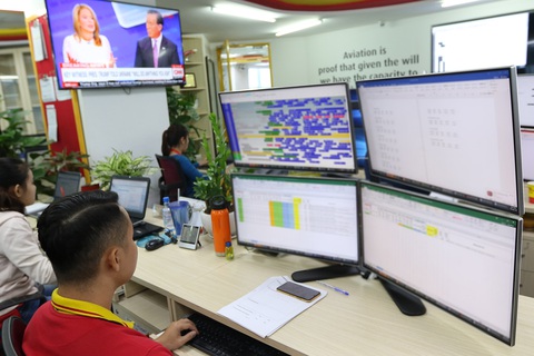 Vào trái tim điều hành hãng bay Vietjet trong dịp Tết - Ảnh 2. Vào trái tim điều hành hãng bay Vietjet trong dịp Tết - Ảnh 2.