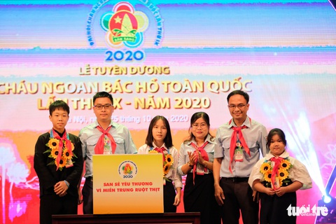 Thiếu nhi Cháu ngoan Bác Hồ chung tay ủng hộ thiếu nhi miền Trung - Ảnh 1. Thiếu nhi Cháu ngoan Bác Hồ chung tay ủng hộ thiếu nhi miền Trung - Ảnh 1.