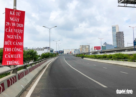 Cấm xe qua cầu vượt Nguyễn Hữu Cảnh 6 tháng để sửa đường - Ảnh 6. Cấm xe qua cầu vượt Nguyễn Hữu Cảnh 6 tháng để sửa đường - Ảnh 6.