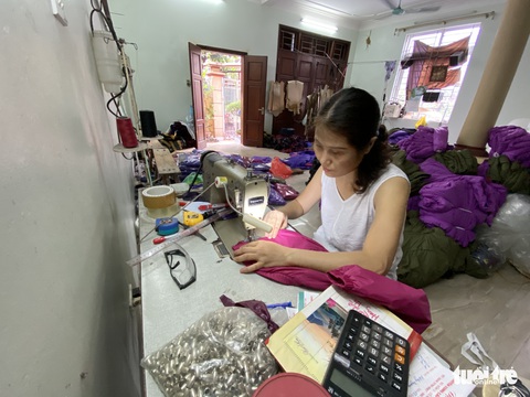 Làng nghề may Cổ Nhuế lo mất kế sinh nhai - Ảnh 5. Làng nghề may Cổ Nhuế lo mất kế sinh nhai - Ảnh 5.