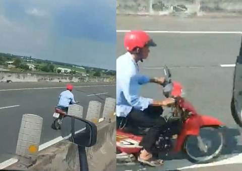 Núp sau xe tải rồi bất ngờ phóng xe máy chạy ngược chiều vào làn cao tốc - Ảnh 1. Núp sau xe tải rồi bất ngờ phóng xe máy chạy ngược chiều vào làn cao tốc - Ảnh 1.