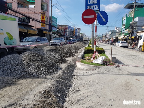 Quốc lộ 91 sẽ làm cuốn chiếu để không ùn tắc giao thông - Ảnh 2. Quốc lộ 91 sẽ làm cuốn chiếu để không ùn tắc giao thông - Ảnh 2.
