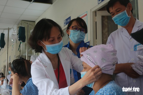 Bữa cơm ngày cuối năm của bệnh nhân ung thư ở Bệnh viện Từ Dũ - Ảnh 9. Bữa cơm ngày cuối năm của bệnh nhân ung thư ở Bệnh viện Từ Dũ - Ảnh 9.
