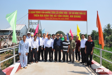 Khánh thành 25 cây cầu do nguyên Chủ tịch nước Trương Tấn Sang vận động tài trợ - Ảnh 1. Khánh thành 25 cây cầu do nguyên Chủ tịch nước Trương Tấn Sang vận động tài trợ - Ảnh 1.