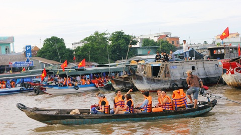 Du lịch “tắm nắng” xứ miệt vườn hút khách - Ảnh 1. Du lịch “tắm nắng” xứ miệt vườn hút khách - Ảnh 1.