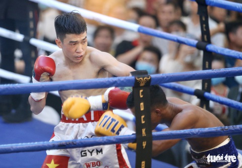 Đêm toàn thắng của quyền Anh Việt Nam tranh đai WBO châu Á - Thái Bình Dương - Ảnh 7. Đêm toàn thắng của quyền Anh Việt Nam tranh đai WBO châu Á - Thái Bình Dương - Ảnh 7.
