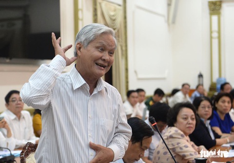 Gần như tất cả người dân đang xài khẩu trang sai cách - Ảnh 1. Gần như tất cả người dân đang xài khẩu trang sai cách - Ảnh 1.