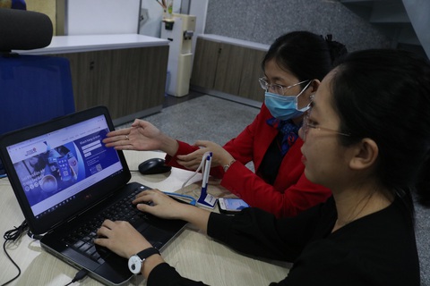 Giảm nửa phí chuyển tiền cho hạn mức dưới 2 triệu đồng - Ảnh 1. Giảm nửa phí chuyển tiền cho hạn mức dưới 2 triệu đồng - Ảnh 1.