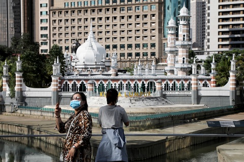 Malaysia đóng cửa biên giới, phong tỏa nhiều nơi vì COVID-19 - Ảnh 2. Malaysia đóng cửa biên giới, phong tỏa nhiều nơi vì COVID-19 - Ảnh 2.