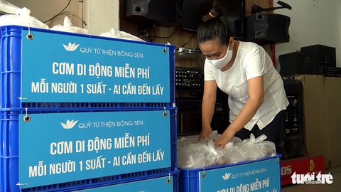 Suất cơm 0 đồng cho người nghèo ngày cách ly - Ảnh 2. Suất cơm 0 đồng cho người nghèo ngày cách ly - Ảnh 2.