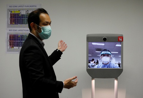 Singapore lập bệnh viện dã chiến hơn 4.000 giường, dùng nhiều robot - Ảnh 5. Singapore lập bệnh viện dã chiến hơn 4.000 giường, dùng nhiều robot - Ảnh 5.