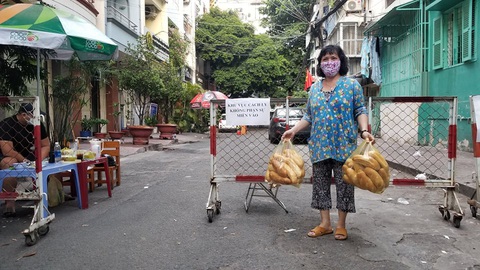 Bệnh nhân COVID-19 số 92 ở TP.HCM dương tính lại, cách ly một block chung cư - Ảnh 1. Bệnh nhân COVID-19 số 92 ở TP.HCM dương tính lại, cách ly một block chung cư - Ảnh 1.