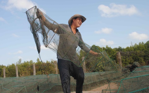 Xóm biển Khánh Hội sau 23 năm hứng cơn cuồng phong Linda - Ảnh 1. Xóm biển Khánh Hội sau 23 năm hứng cơn cuồng phong Linda - Ảnh 1.