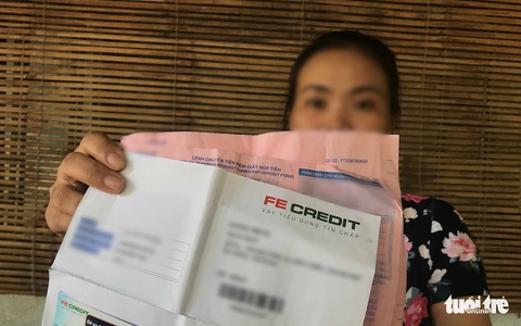Mắc nợ hàng chục triệu dù chưa dùng thẻ tín dụng - Ảnh 1. Mắc nợ hàng chục triệu dù chưa dùng thẻ tín dụng - Ảnh 1.