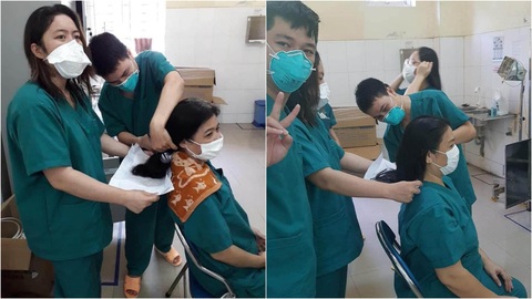 Các nữ bác sĩ ở Đà Nẵng cắt ngắn tóc để lên tuyến đầu COVID-19 - Ảnh 1. Các nữ bác sĩ ở Đà Nẵng cắt ngắn tóc để lên tuyến đầu COVID-19 - Ảnh 1.