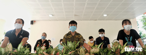Hà Nội xét nghiệm nhanh COVID-19 cho người trở về từ Đà Nẵng, Quảng Nam - Ảnh 3. Hà Nội xét nghiệm nhanh COVID-19 cho người trở về từ Đà Nẵng, Quảng Nam - Ảnh 3.