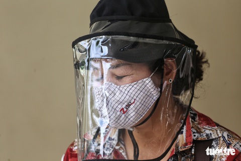 Hà Nội xét nghiệm nhanh COVID-19 cho người trở về từ Đà Nẵng, Quảng Nam - Ảnh 11. Hà Nội xét nghiệm nhanh COVID-19 cho người trở về từ Đà Nẵng, Quảng Nam - Ảnh 11.