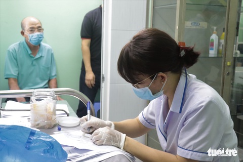 Ngày 12-8, TP.HCM dứt điểm xét nghiệm COVID-19 người từ Đà Nẵng về - Ảnh 1. Ngày 12-8, TP.HCM dứt điểm xét nghiệm COVID-19 người từ Đà Nẵng về - Ảnh 1.