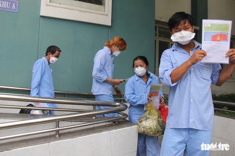Bé gái 1 tuổi và 9 người khác ở Đà Nẵng được công bố khỏi COVID-19 - Ảnh 1. Bé gái 1 tuổi và 9 người khác ở Đà Nẵng được công bố khỏi COVID-19 - Ảnh 1.