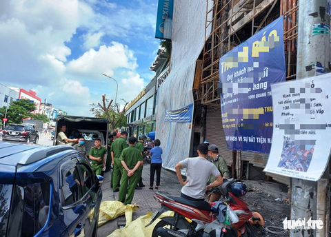 Thực nghiệm hiện trường vụ cháy chi nhánh Ngân hàng Eximbank ở Gò Vấp - Ảnh 2. Thực nghiệm hiện trường vụ cháy chi nhánh Ngân hàng Eximbank ở Gò Vấp - Ảnh 2.