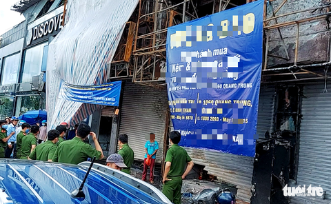 Thực nghiệm hiện trường vụ cháy chi nhánh Ngân hàng Eximbank ở Gò Vấp - Ảnh 4. Thực nghiệm hiện trường vụ cháy chi nhánh Ngân hàng Eximbank ở Gò Vấp - Ảnh 4.