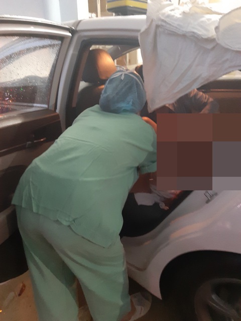 Mẹ bầu vượt cạn sinh con trên taxi trong bão - Ảnh 1. Mẹ bầu vượt cạn sinh con trên taxi trong bão - Ảnh 1.