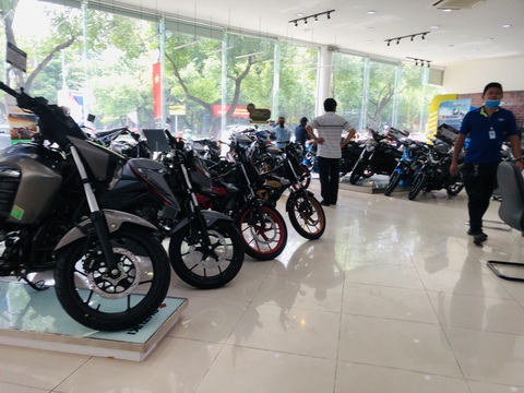 Thị trường xe máy bão hòa, tiêu thụ chậm - Ảnh 1. Thị trường xe máy bão hòa, tiêu thụ chậm - Ảnh 1.