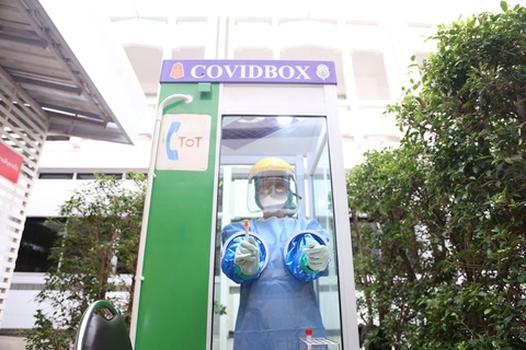 Bốt điện thoại thành điểm xét nghiệm COVID-19 - Ảnh 1. Bốt điện thoại thành điểm xét nghiệm COVID-19 - Ảnh 1.