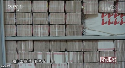Choáng với núi tiền mặt 2 tấn trong nhà quan tham Trung Quốc bị tuyên tử hình - Ảnh 2. Choáng với núi tiền mặt 2 tấn trong nhà quan tham Trung Quốc bị tuyên tử hình - Ảnh 2.
