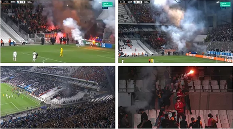 Cổ động viên ném pháo sáng khắp nơi, trận Marseille với Galatasaray bị hoãn 8 phút - Ảnh 1. Cổ động viên ném pháo sáng khắp nơi, trận Marseille với Galatasaray bị hoãn 8 phút - Ảnh 1.