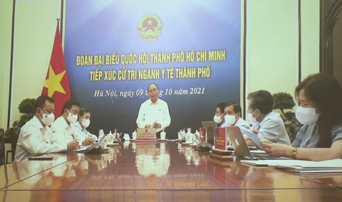 Chủ tịch nước Nguyễn Xuân Phúc: TP.HCM từng bước mở cửa nhưng phải kiểm soát rủi ro - Ảnh 1. Chủ tịch nước Nguyễn Xuân Phúc: TP.HCM từng bước mở cửa nhưng phải kiểm soát rủi ro - Ảnh 1.