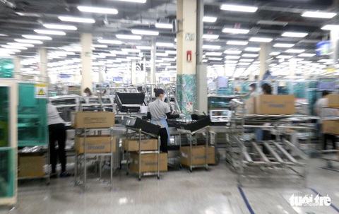 Tất bật sản xuất thời ‘bình thường mới’ trong nhà máy ở TP.HCM - Ảnh 2. Tất bật sản xuất thời ‘bình thường mới’ trong nhà máy ở TP.HCM - Ảnh 2.