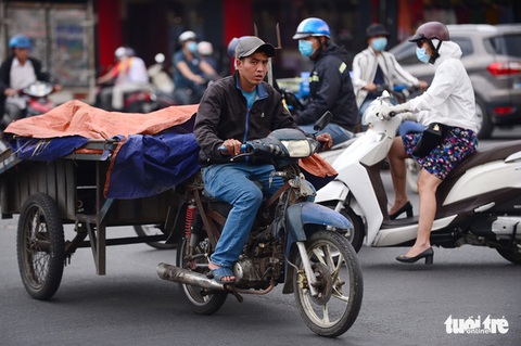 TP.HCM: Vẫn cho xe thô sơ ba, bốn bánh hoạt động - Ảnh 1. TP.HCM: Vẫn cho xe thô sơ ba, bốn bánh hoạt động - Ảnh 1.