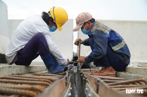 Cao tốc Trung Lương - Mỹ Thuận chạy nước rút để thông xe dịp Tết Nguyên đán 2022 - Ảnh 4. Cao tốc Trung Lương - Mỹ Thuận chạy nước rút để thông xe dịp Tết Nguyên đán 2022 - Ảnh 4.