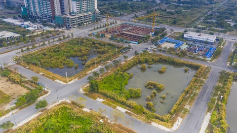 Đấu giá đất vàng ở Thủ Thiêm: Qua thời chỉ định, trao tay đất giá rẻ - Ảnh 9. Đấu giá đất vàng ở Thủ Thiêm: Qua thời chỉ định, trao tay đất giá rẻ - Ảnh 9.