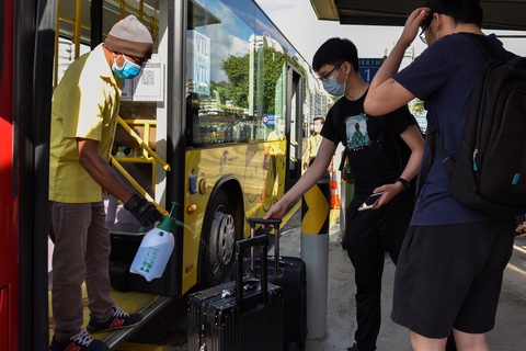 Singapore chuẩn bị sống chung với Omicron như Delta - Ảnh 1. Singapore chuẩn bị sống chung với Omicron như Delta - Ảnh 1.