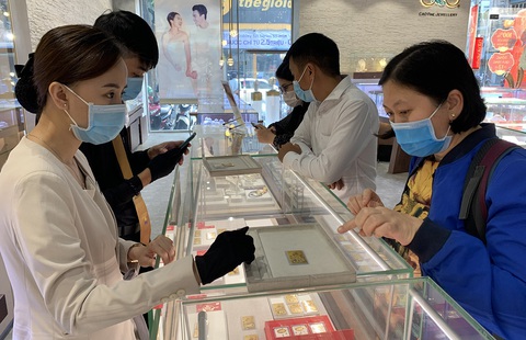 Ẩn số sức mua vàng ngày Thần tài - Ảnh 2. Ẩn số sức mua vàng ngày Thần tài - Ảnh 2.
