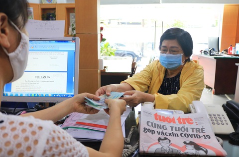 Nhà nước tốn kém quá rồi nên cùng góp vắc xin COVID-19 đẩy lùi dịch bệnh - Ảnh 1. Nhà nước tốn kém quá rồi nên cùng góp vắc xin COVID-19 đẩy lùi dịch bệnh - Ảnh 1.