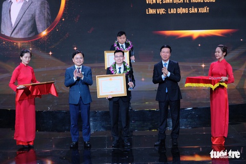 Gương mặt trẻ Việt Nam: Những viên gạch hồng dựng thành lũy chống dịch - Ảnh 1. Gương mặt trẻ Việt Nam: Những viên gạch hồng dựng thành lũy chống dịch - Ảnh 1.