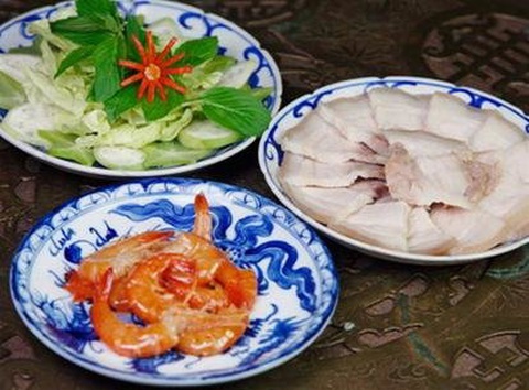 Bữa ăn người Việt quá nhiều thịt - Ảnh 1. Bữa ăn người Việt quá nhiều thịt - Ảnh 1.